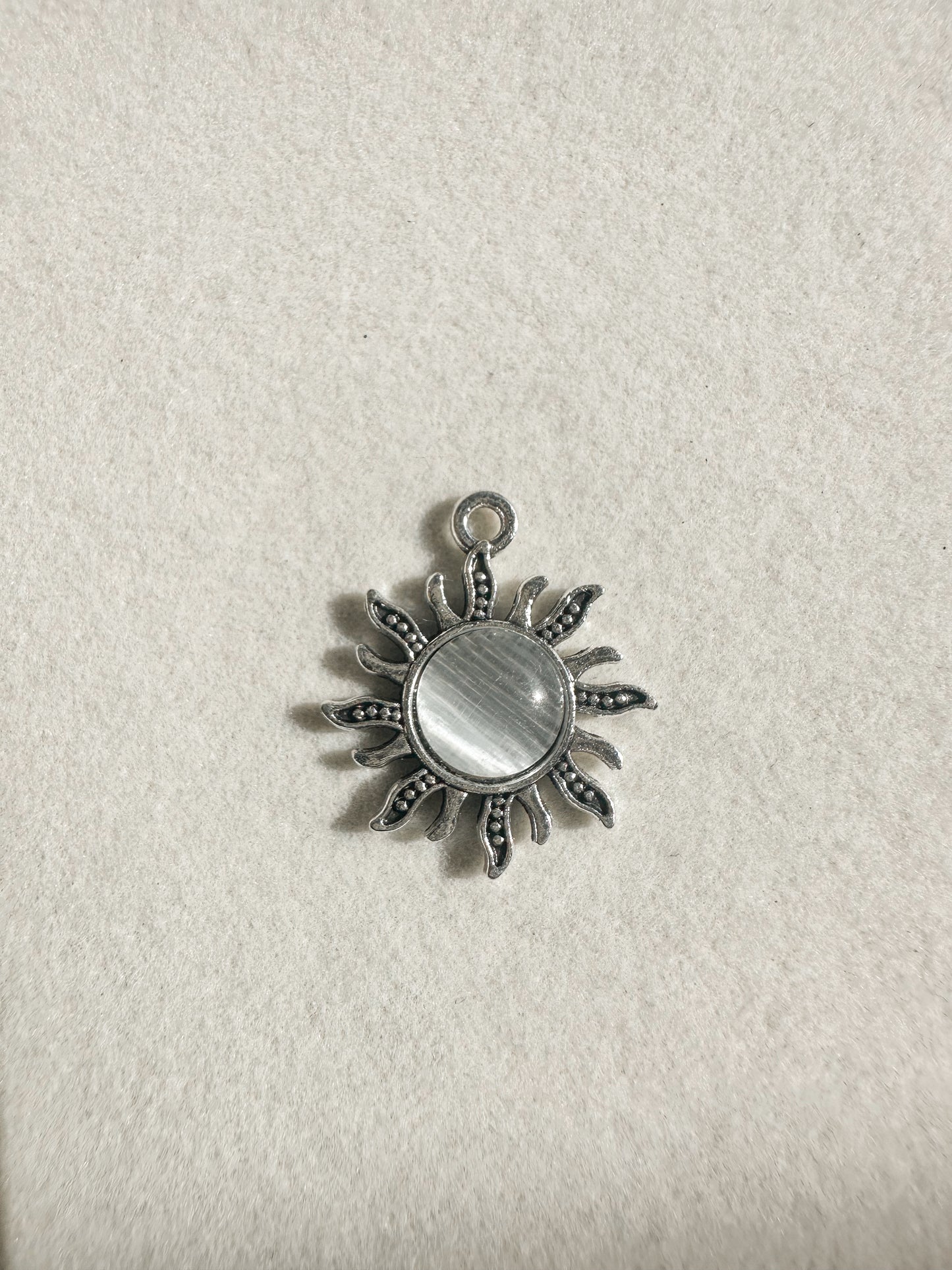 Silver Sun Charm